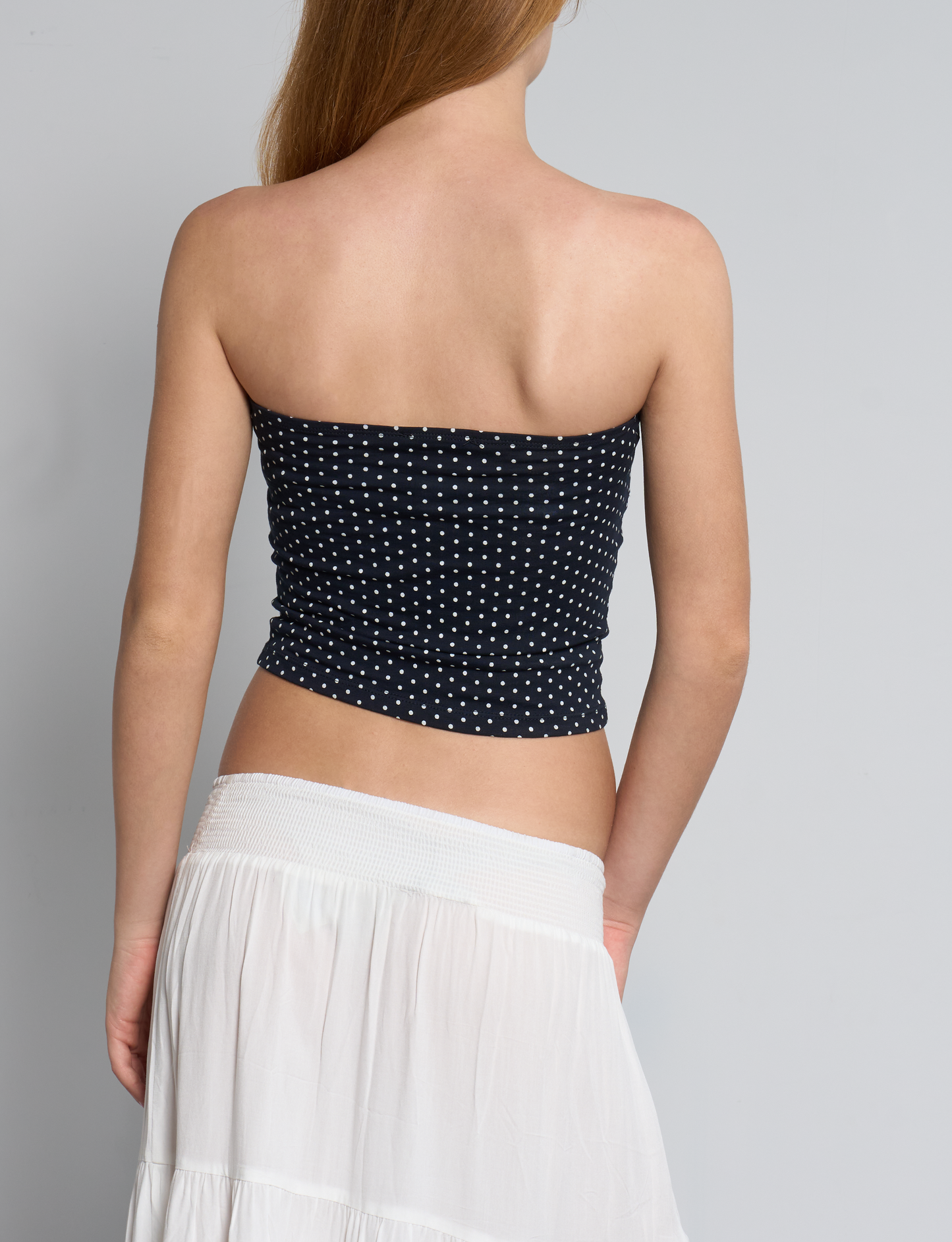 Top a fascia blu navy con pois