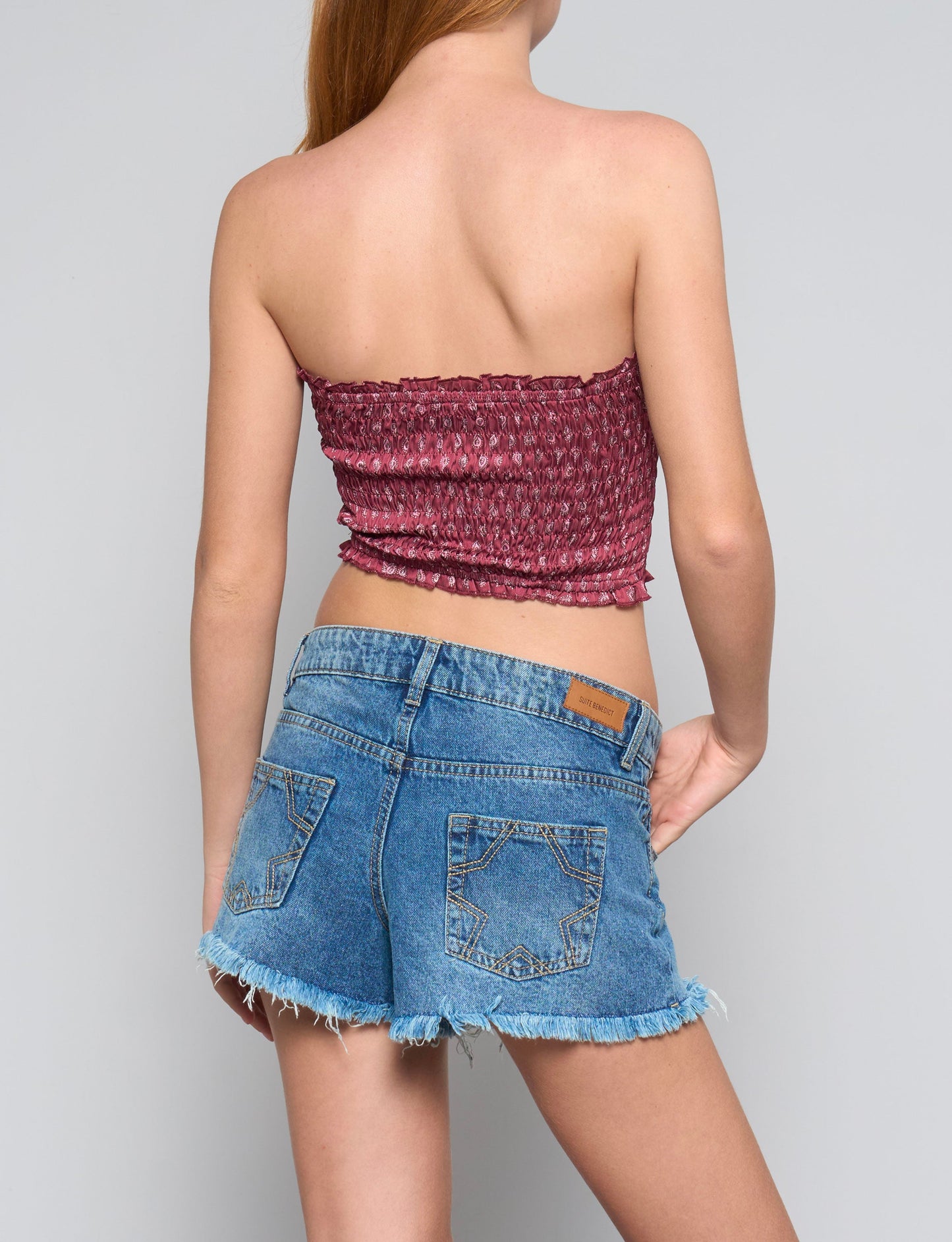 Top a fascia arricciato rosso