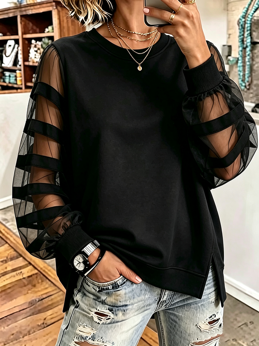 Elegante sudadera negra con paneles de malla