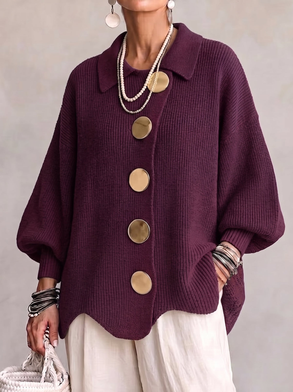 Cárdigan de punto oversize con cuello y grandes botones metálicos
