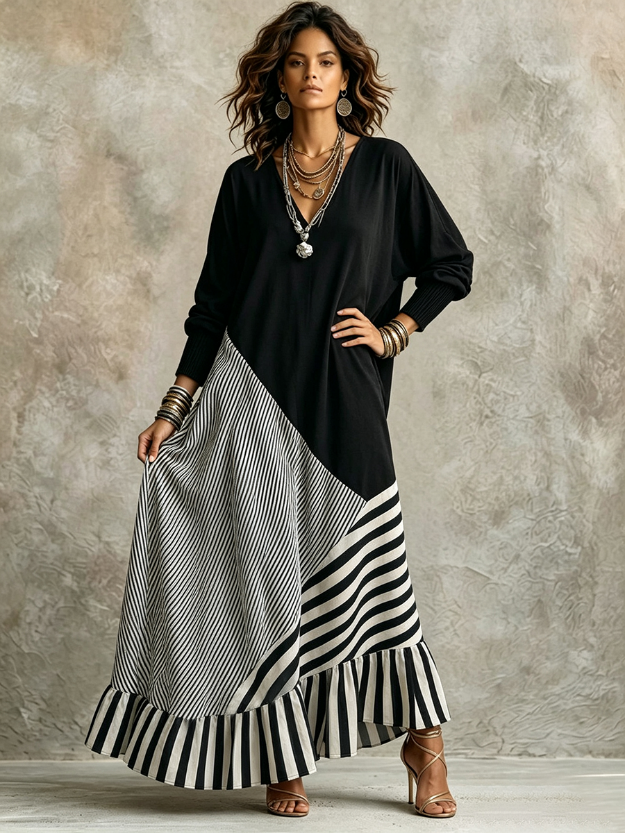 Elegante vestido maxi negro y de rayas con tejido elástico