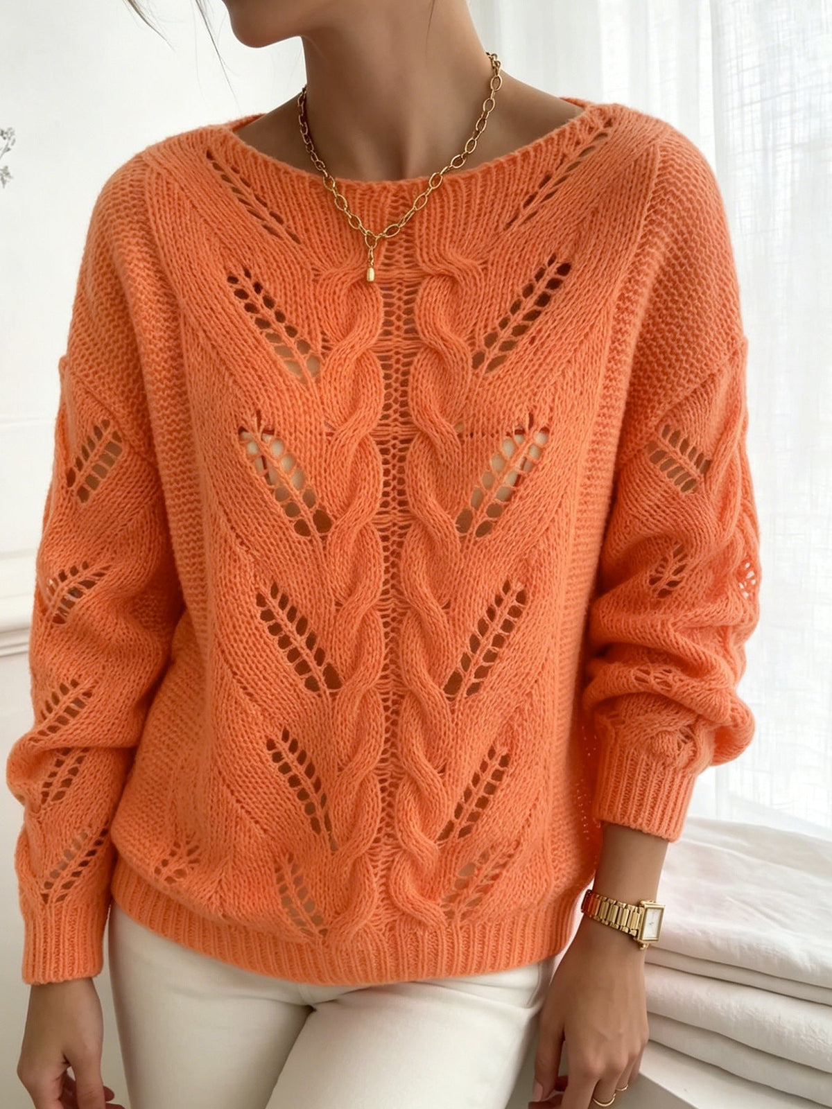 Jersey naranja vibrante de punto calado con textura