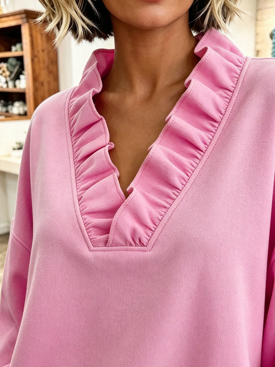 Sudadera oversize rosa vibrante con volantes
