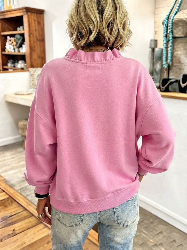 Sudadera oversize rosa vibrante con volantes