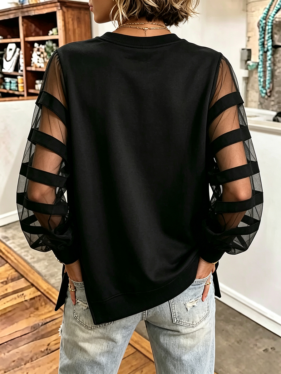 Elegante sudadera negra con paneles de malla
