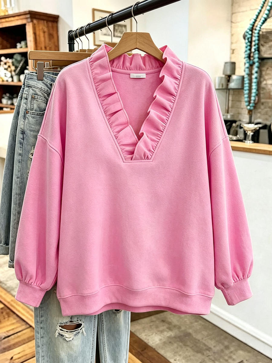 Sudadera oversize rosa vibrante con volantes