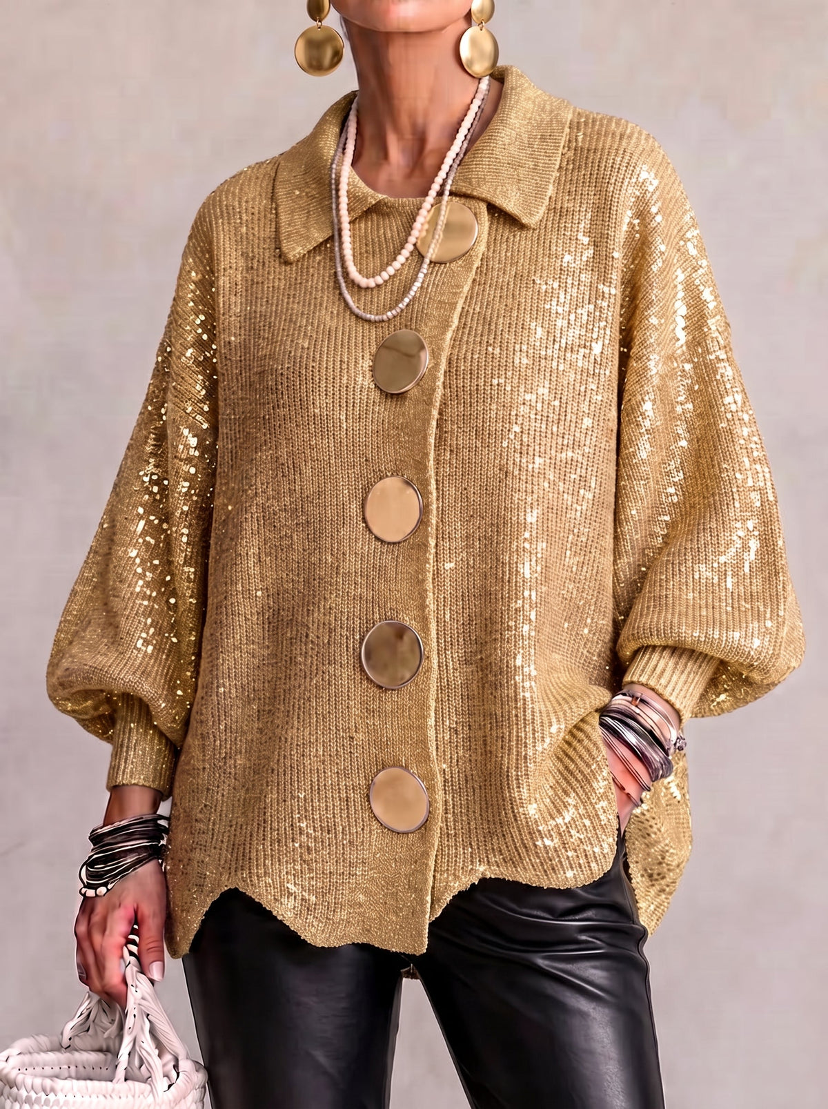 Cárdigan de punto oversize con cuello y grandes botones metálicos
