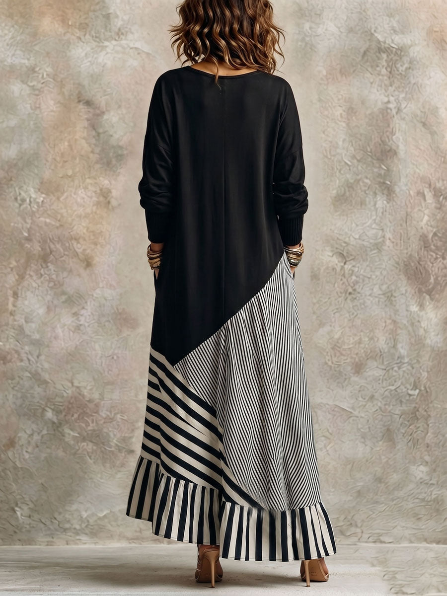 Elegante vestido maxi negro y de rayas con tejido elástico