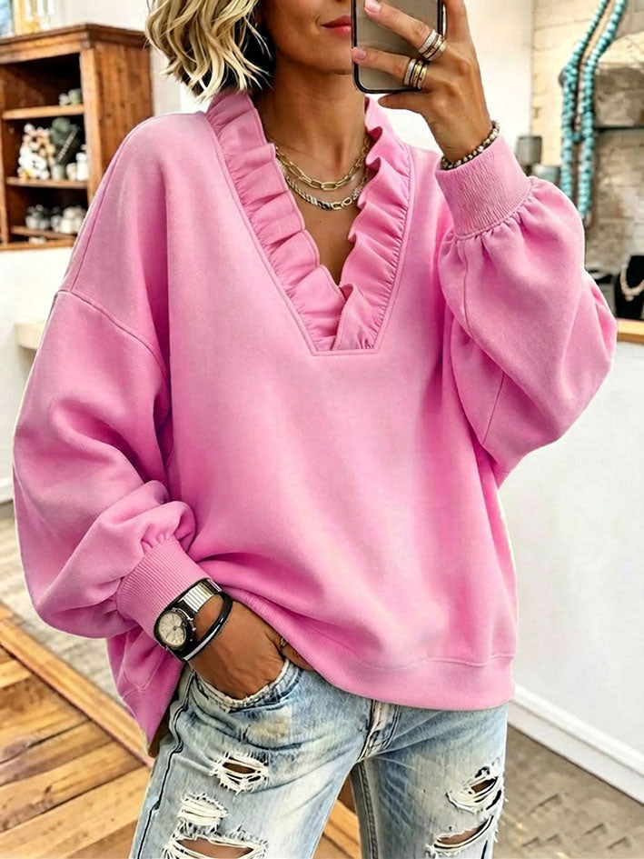 Sudadera oversize rosa vibrante con volantes